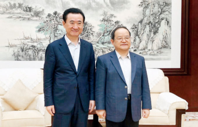 3月23日,广西壮族自治区政府主席陈武在南宁会见王健林董事长.