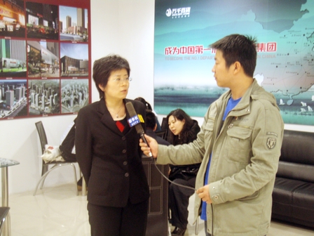 万千百货发起2009人信心传递挑战基尼斯活动